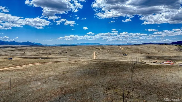 a view of road and houses