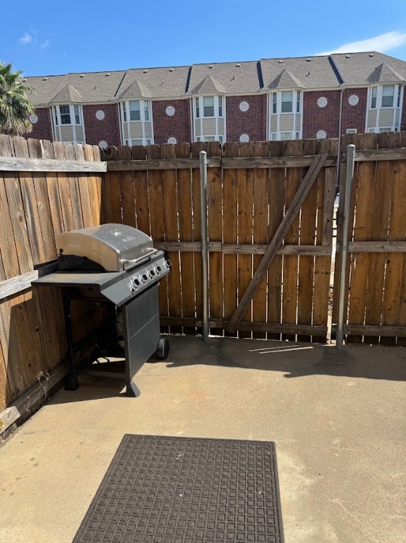 1198 Jones-Butler Road, Unit 1904 College Station, TX 77840 - Photo 15 of 17 a view of a brick house with a small yard
