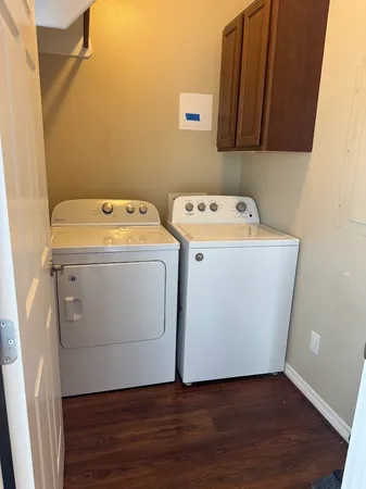 a utility room with dryer and washer
