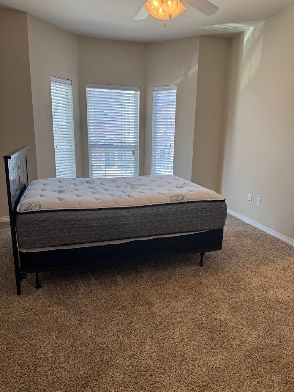 1198 Jones-Butler Road, Unit 1904 College Station, TX 77840 - Photo 9 of 17 a bedroom with bed and window