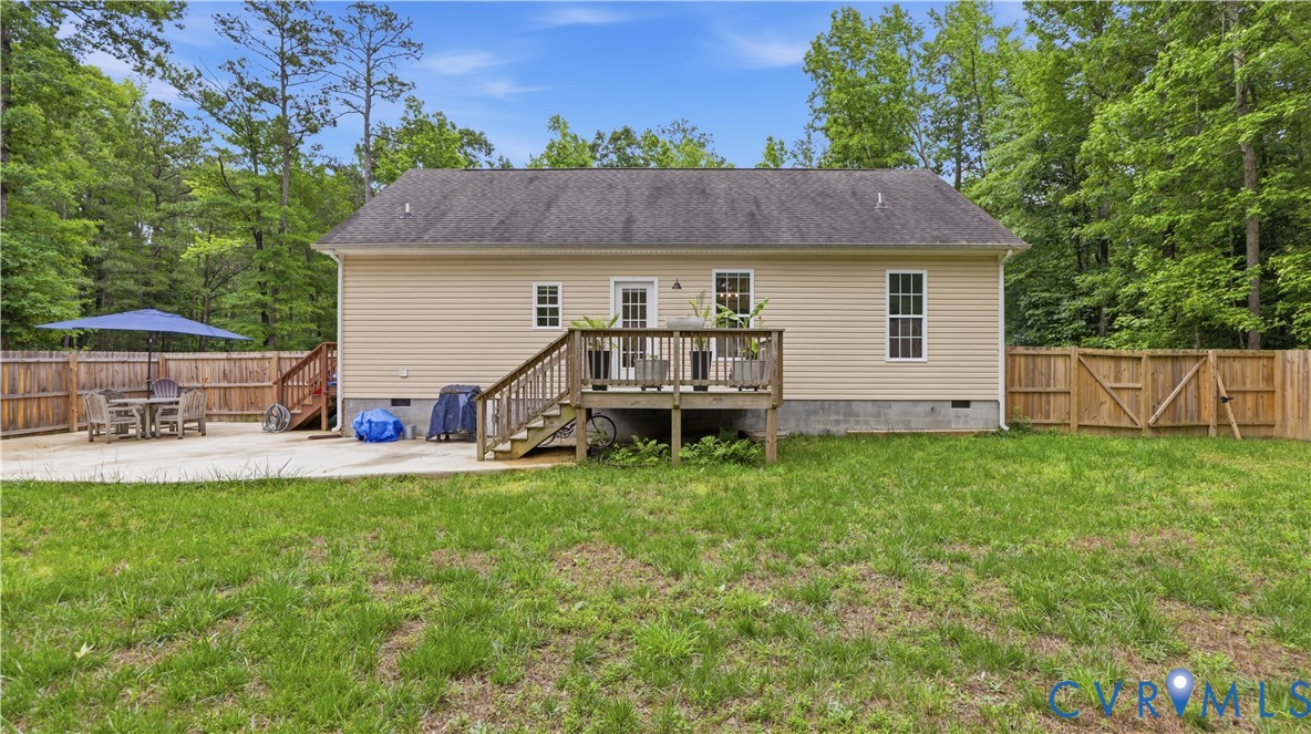 2406 Emanuel Church Road Powhatan, VA 23139 - Photo 33 of 48 Rear exterior featuring a wood-plank deck with sta