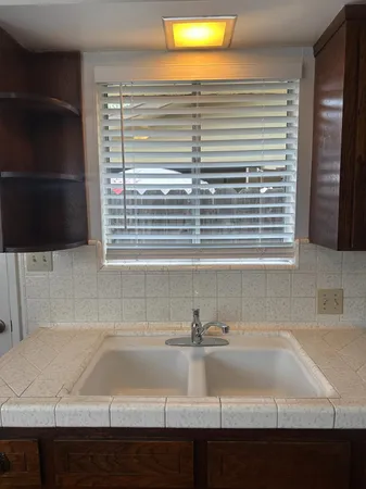 a bathroom with a sink and a bathtub