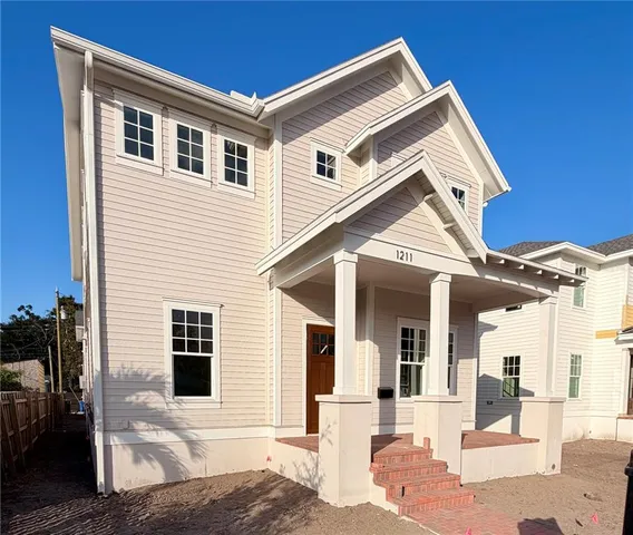 a front view of a house with a garage