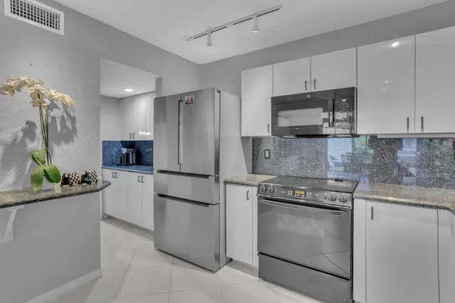 $1,599,000 | 7338 Woodmont Court, Boca Raton, FL 33434