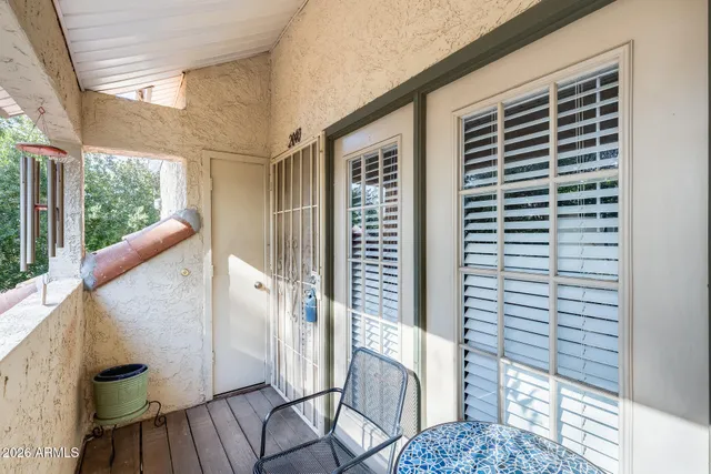 a view of balcony with a potted plant