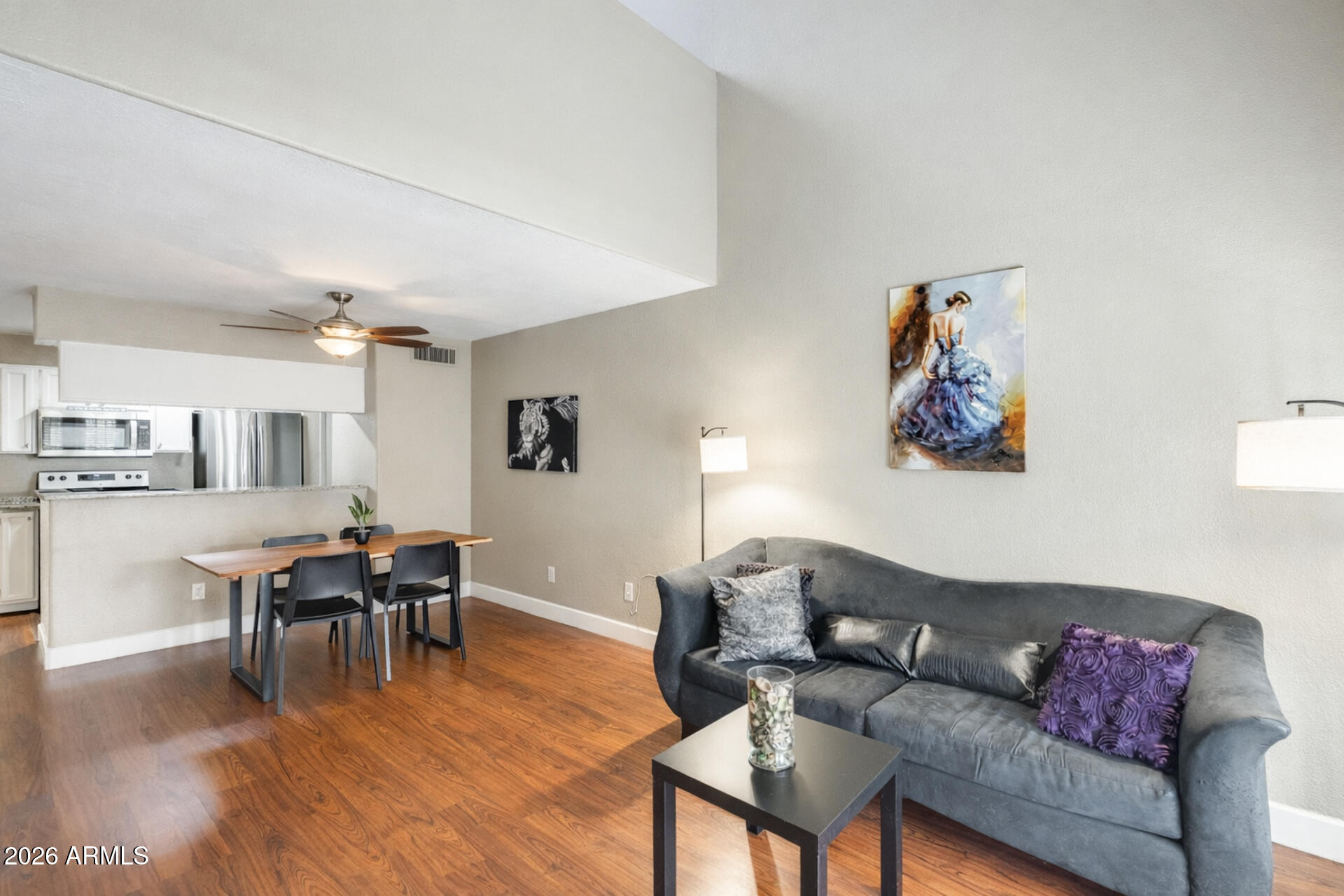 30 East Brown Road, Unit 2040 Mesa, AZ 85201 - Photo 3 of 23 a living room with furniture and wooden floor