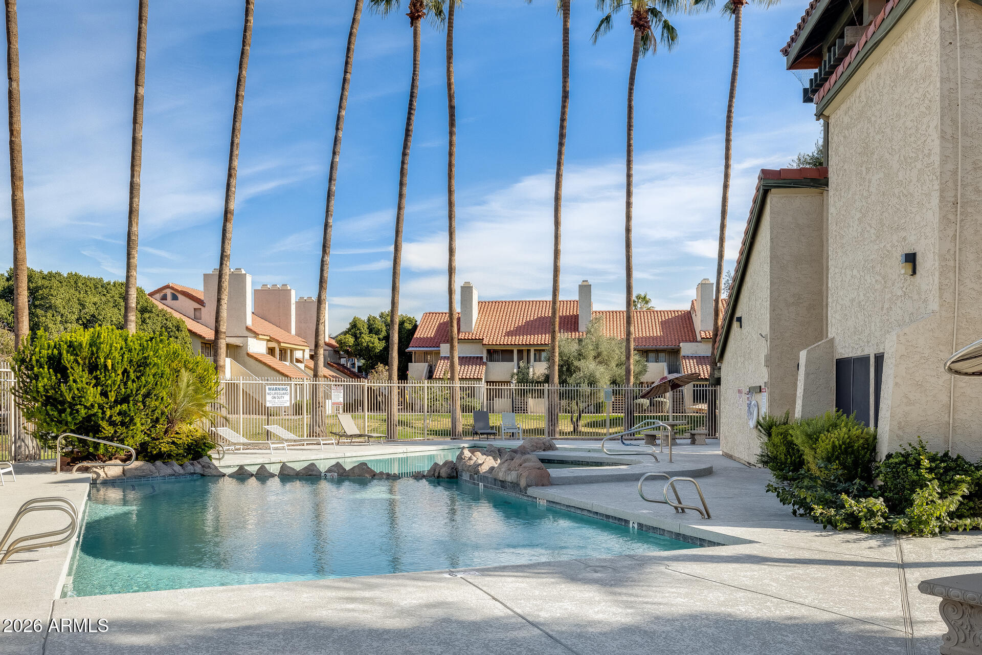 30 East Brown Road, Unit 2040 Mesa, AZ 85201 - Photo 5 of 23 a view of ocean with palm trees