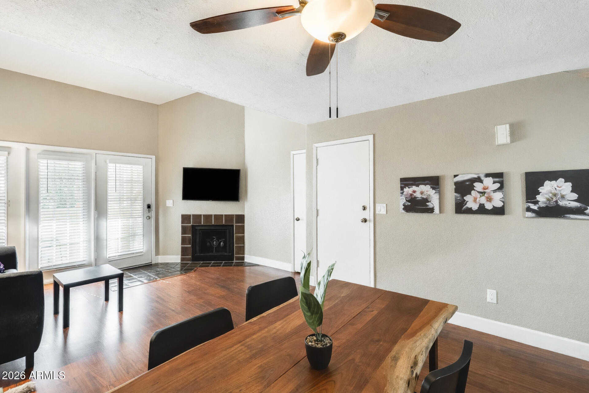 30 East Brown Road, Unit 2040 Mesa, AZ 85201 - Photo 9 of 23 a living room with furniture fireplace and flat screen tv