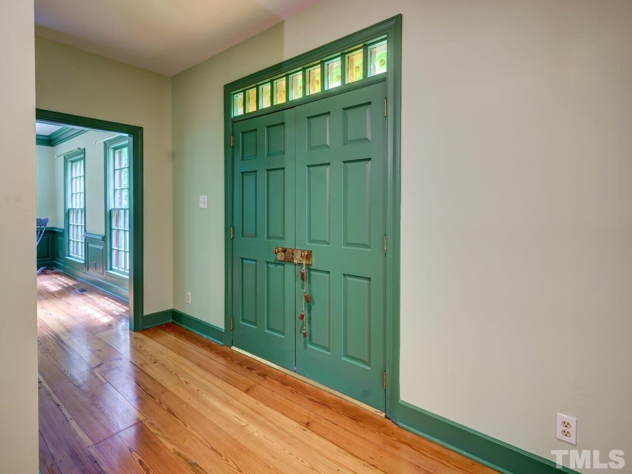 1100 Trail End Road Durham, NC 27712 - Photo 3 of 30 a view of entryway with wooden floor