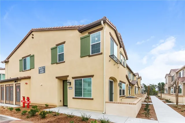 a view of a house with a street