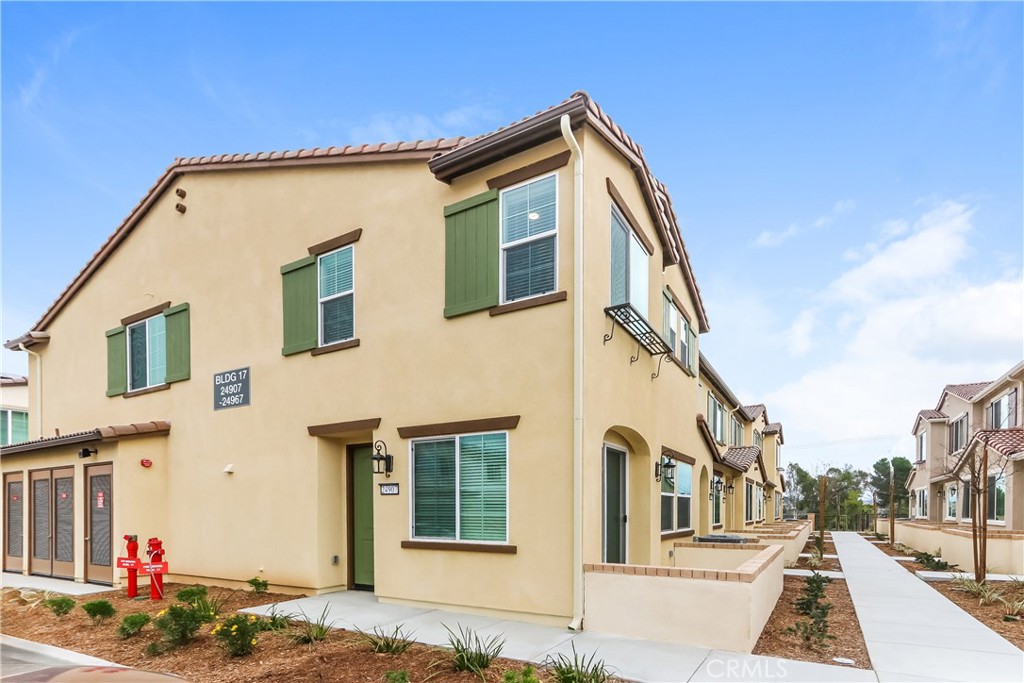a view of a house with a street