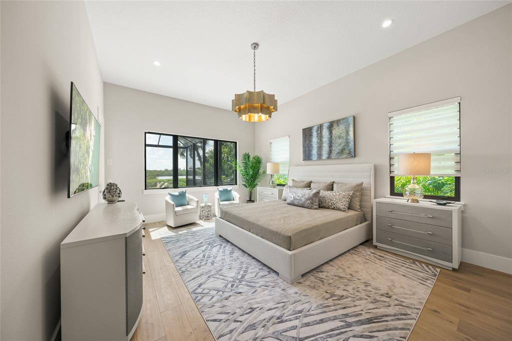 1109 Bayshore Road Nokomis, FL 34275 - Photo 15 of 63 a living room with furniture and a table