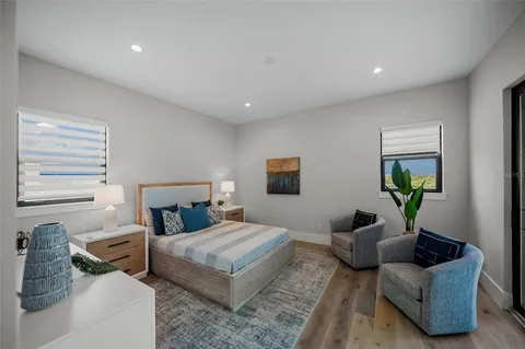 a bathroom with a double vanity sink and mirror