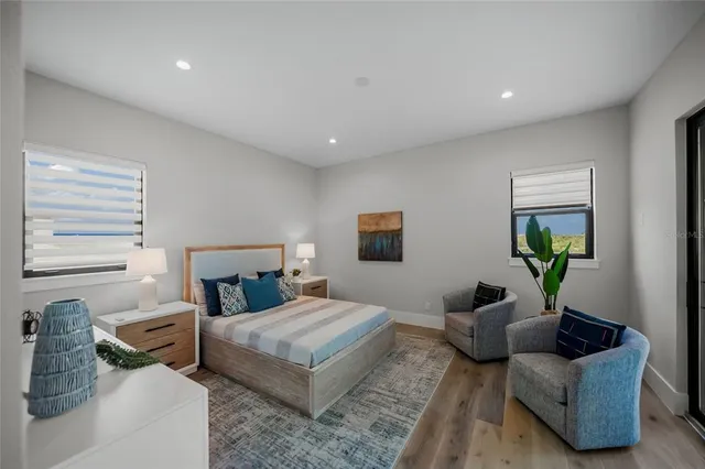 a bathroom with a double vanity sink and mirror