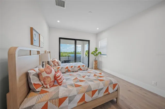 a view of a patio with a table chairs and a patio