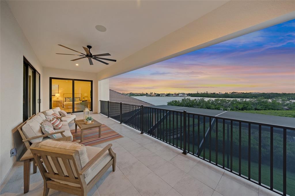 1109 Bayshore Road Nokomis, FL 34275 - Photo 35 of 63 a view of a balcony with furniture