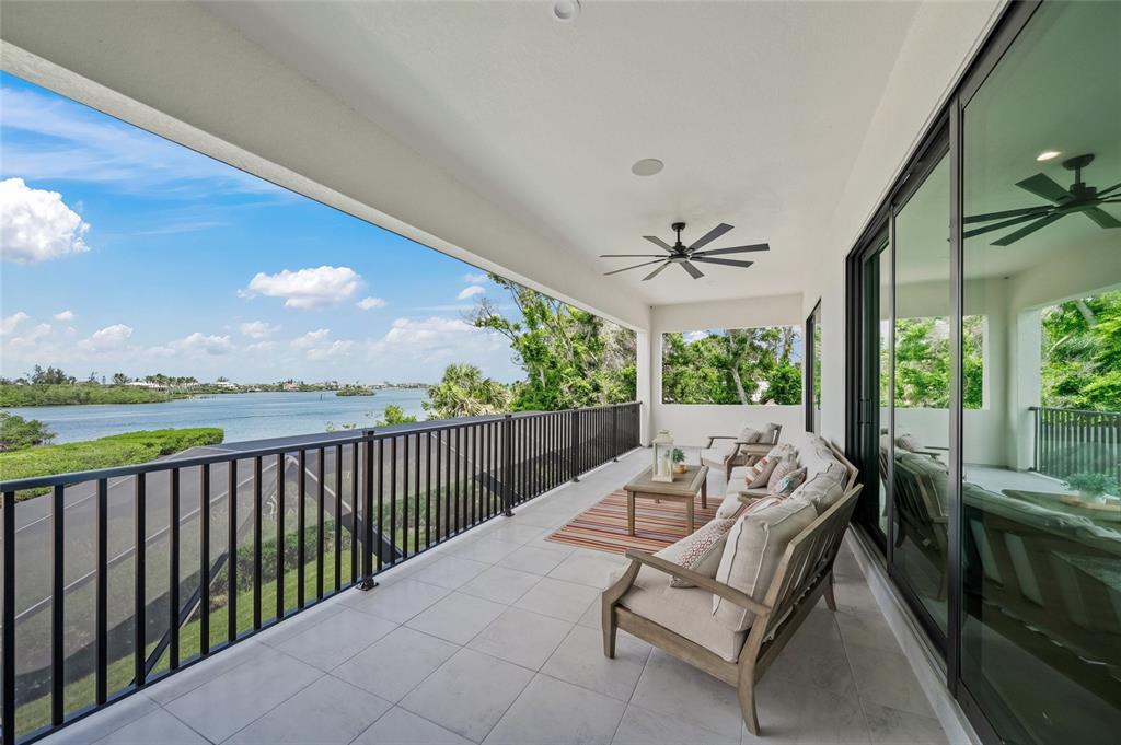 1109 Bayshore Road Nokomis, FL 34275 - Photo 36 of 63 a balcony with furniture