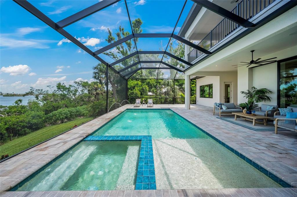 1109 Bayshore Road Nokomis, FL 34275 - Photo 46 of 63 a view of swimming pool with a patio