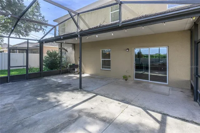 a view of a house with backyard