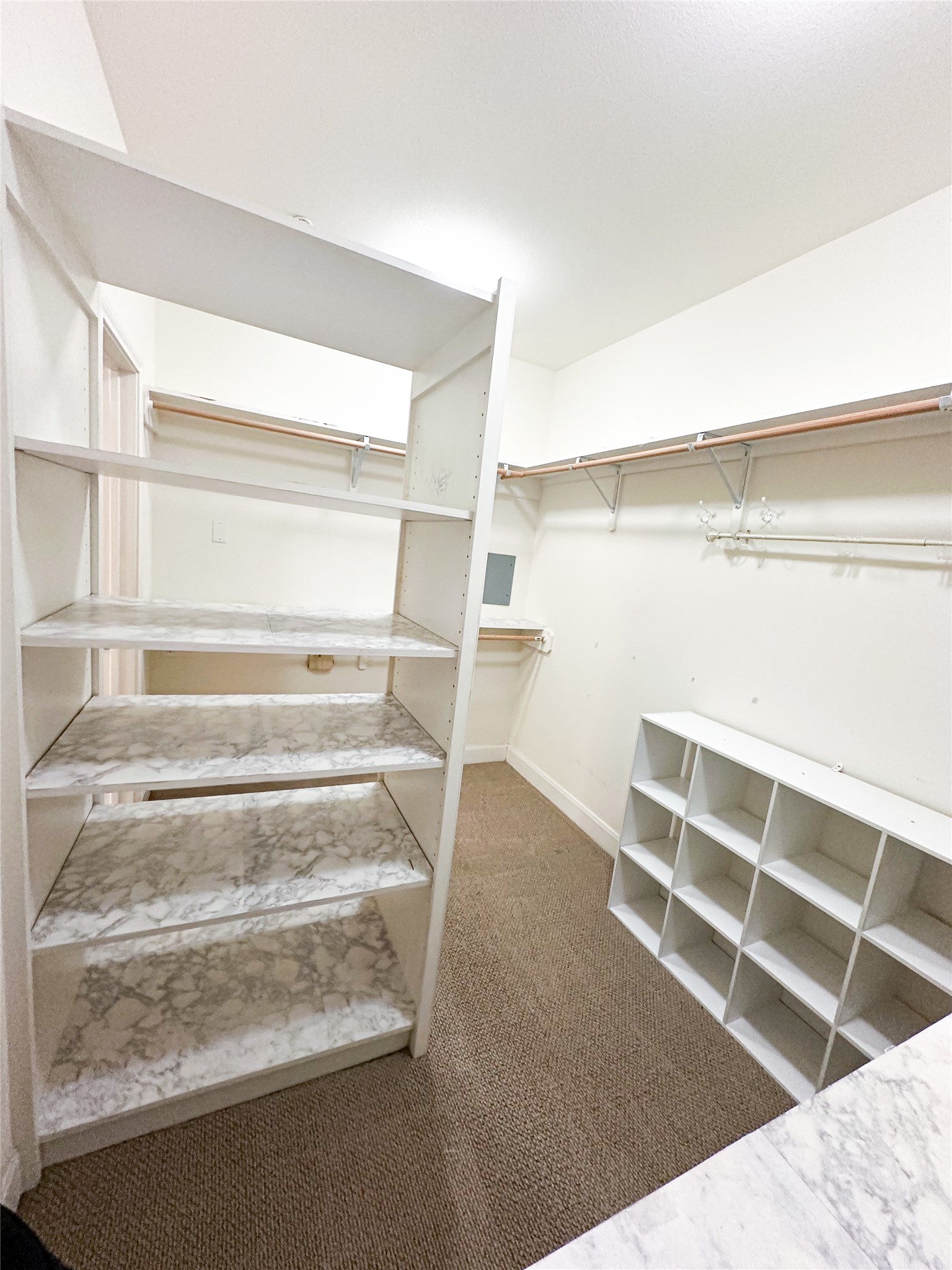 7701 Rialto Boulevard, Unit 1122 Austin, TX 78735 - Photo 16 of 24 Walk-in closet in primary bedroom