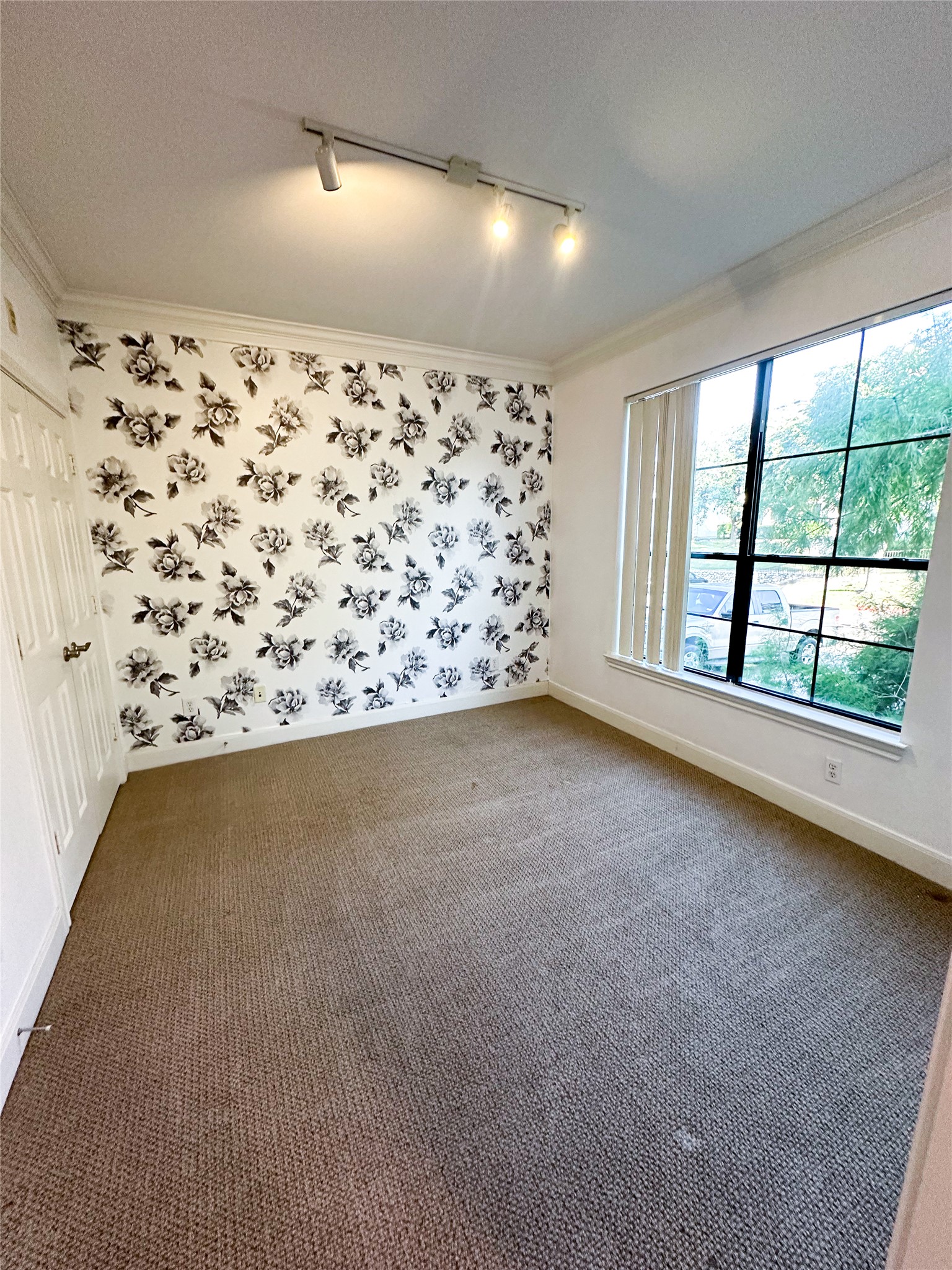 7701 Rialto Boulevard, Unit 1122 Austin, TX 78735 - Photo 18 of 24 Second bedroom with track lighting
