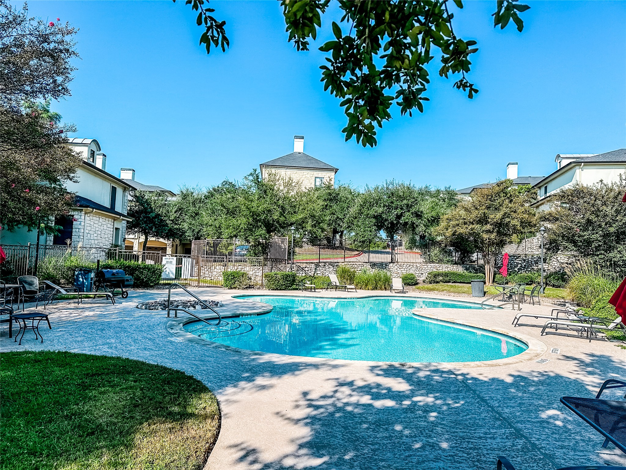 7701 Rialto Boulevard, Unit 1122 Austin, TX 78735 - Photo 2 of 24 Community Pool