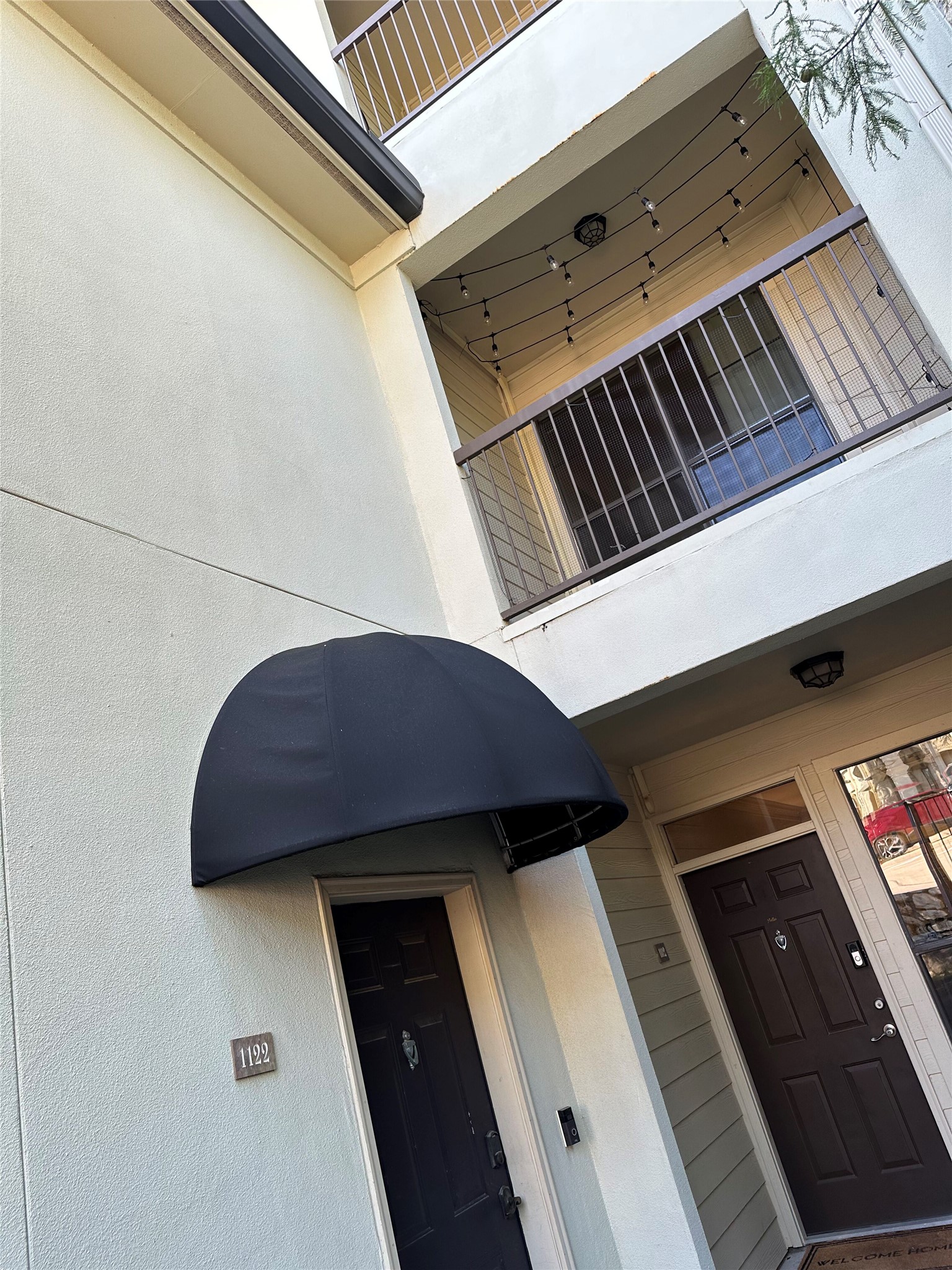 7701 Rialto Boulevard, Unit 1122 Austin, TX 78735 - Photo 22 of 24 Entry with view of covered balcony