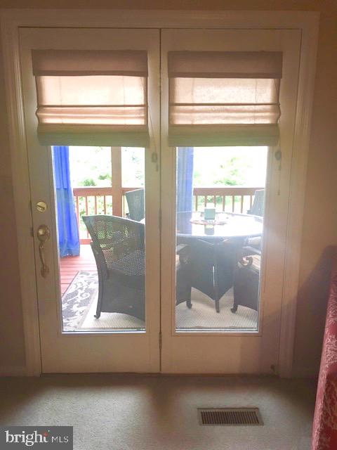 2077 C Raleigh Road, Unit C Hummelstown, PA 17036 - Photo 11 of 35 Living room w French Doors to Upper Deck