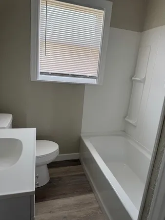 a bathroom with a sink and a toilet