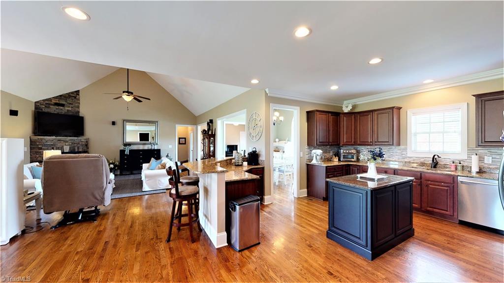 8887 Rymack Drive Oak Ridge, NC 27310 - Photo 12 of 30 Kitchen, great room open plan