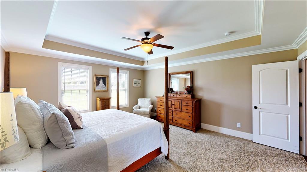 8887 Rymack Drive Oak Ridge, NC 27310 - Photo 16 of 30 Master bedroom