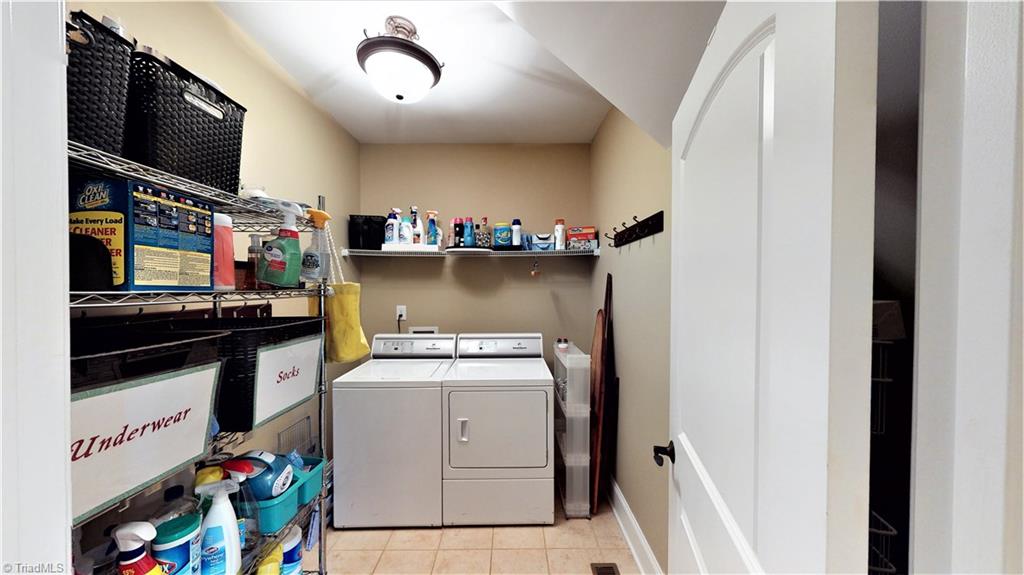 8887 Rymack Drive Oak Ridge, NC 27310 - Photo 26 of 30 Main level laundry room