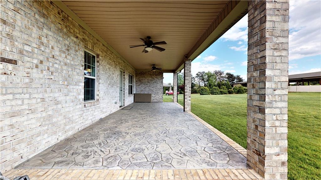 8887 Rymack Drive Oak Ridge, NC 27310 - Photo 27 of 30 Covered back porch