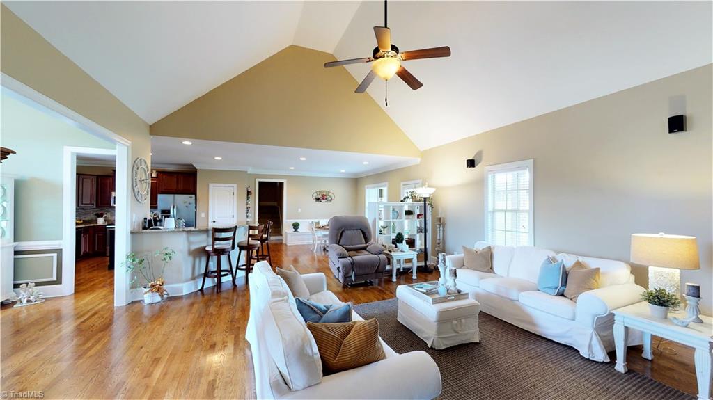 8887 Rymack Drive Oak Ridge, NC 27310 - Photo 8 of 30 Great room - open to breakfast area