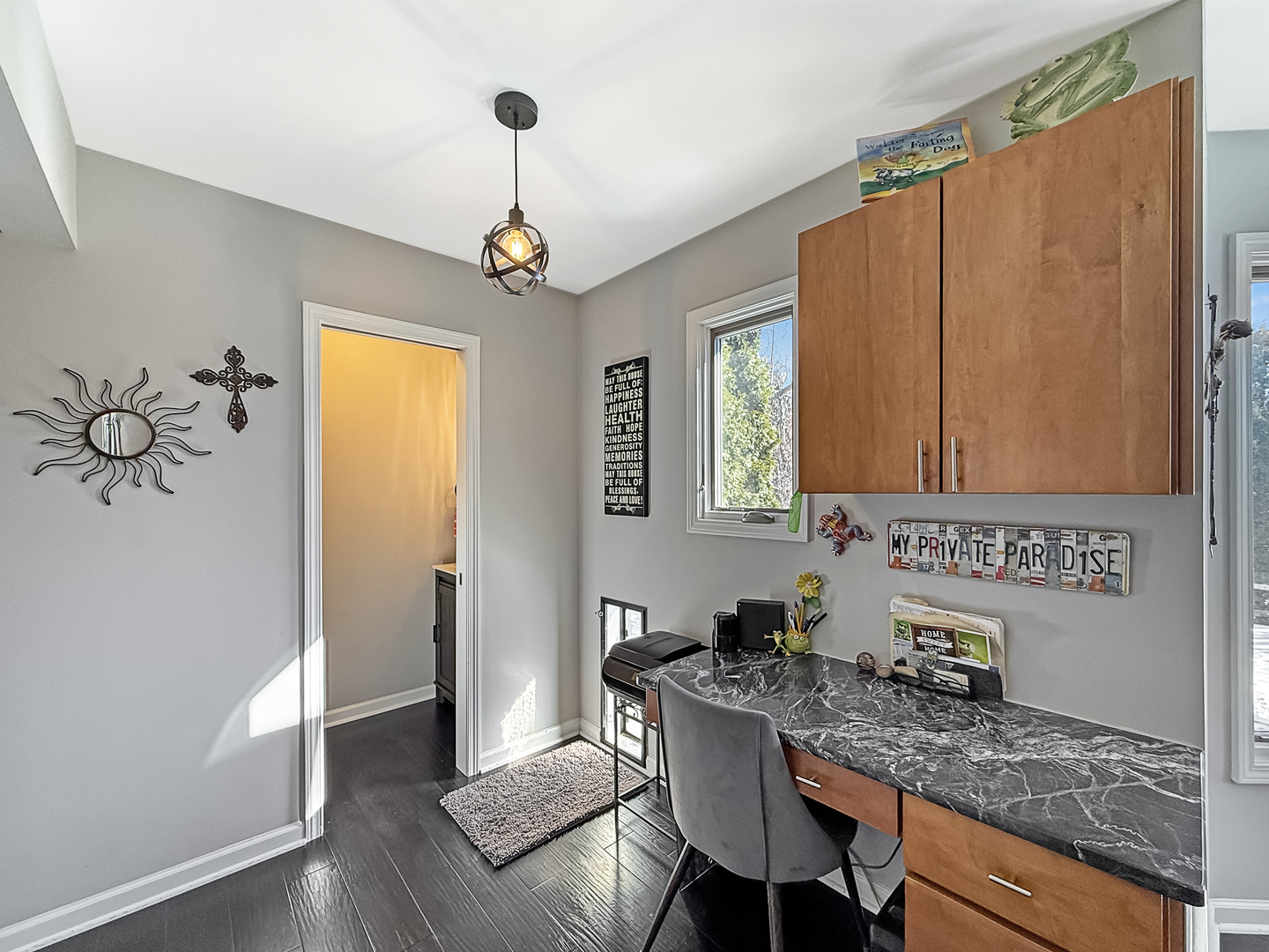 14N857 Timber Ridge Drive Elgin, IL 60124 - Photo 8 of 27 a kitchen with stainless steel appliances granite countertop a sink dishwasher a microwave oven and a dining table with wooden floor