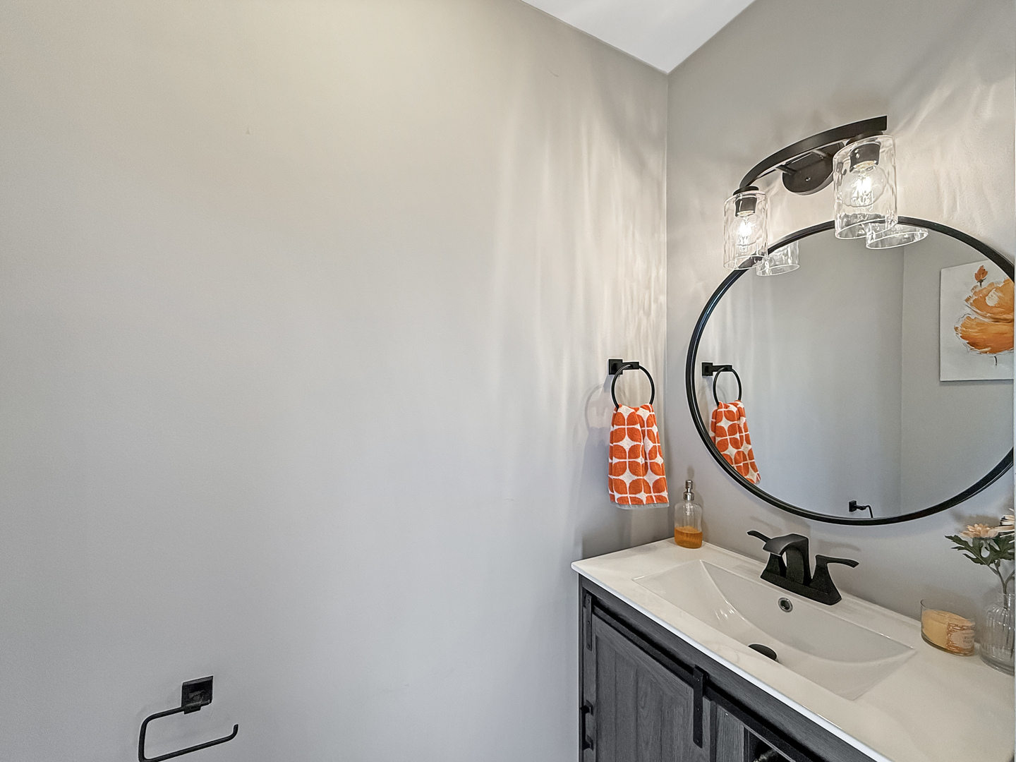 14N857 Timber Ridge Drive Elgin, IL 60124 - Photo 9 of 27 a bathroom with a sink mirror vanity and a toilet