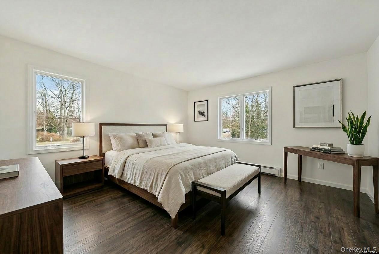 449 West Mombasha Road Monroe, NY 10950 - Photo 9 of 39 a bedroom with a bed and a table in it