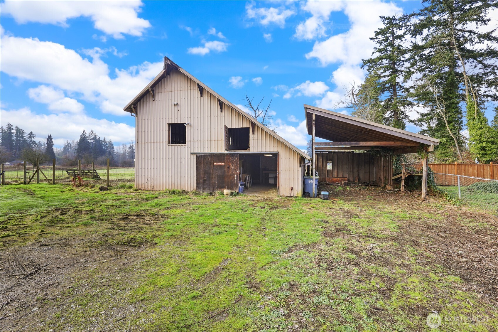 12204 Waller Road East Tacoma, WA 98446 - Photo 24 of 33 a view of a house with a yard