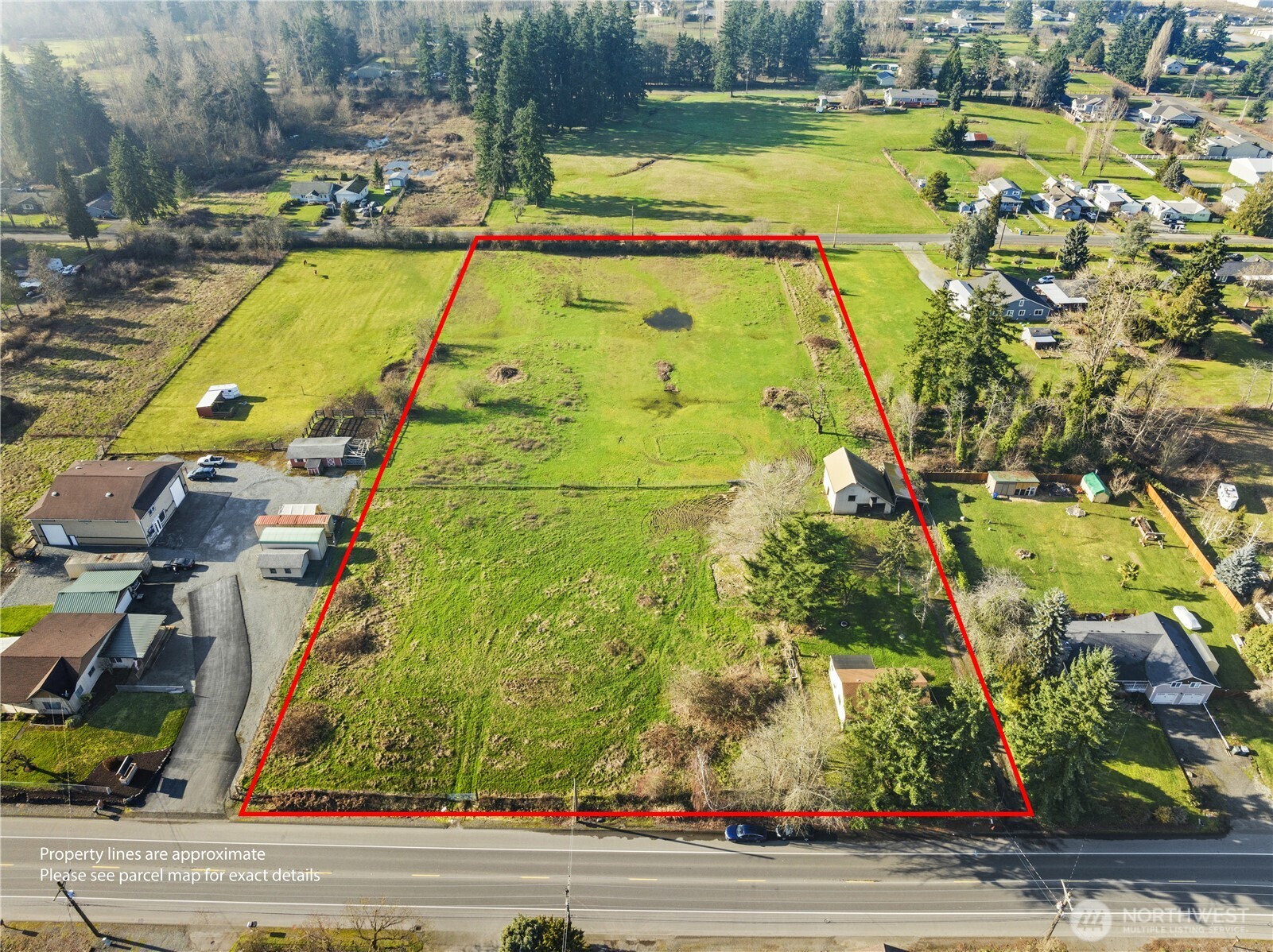 12204 Waller Road East Tacoma, WA 98446 - Photo 32 of 33 swimming pool view with sitting space and garden view