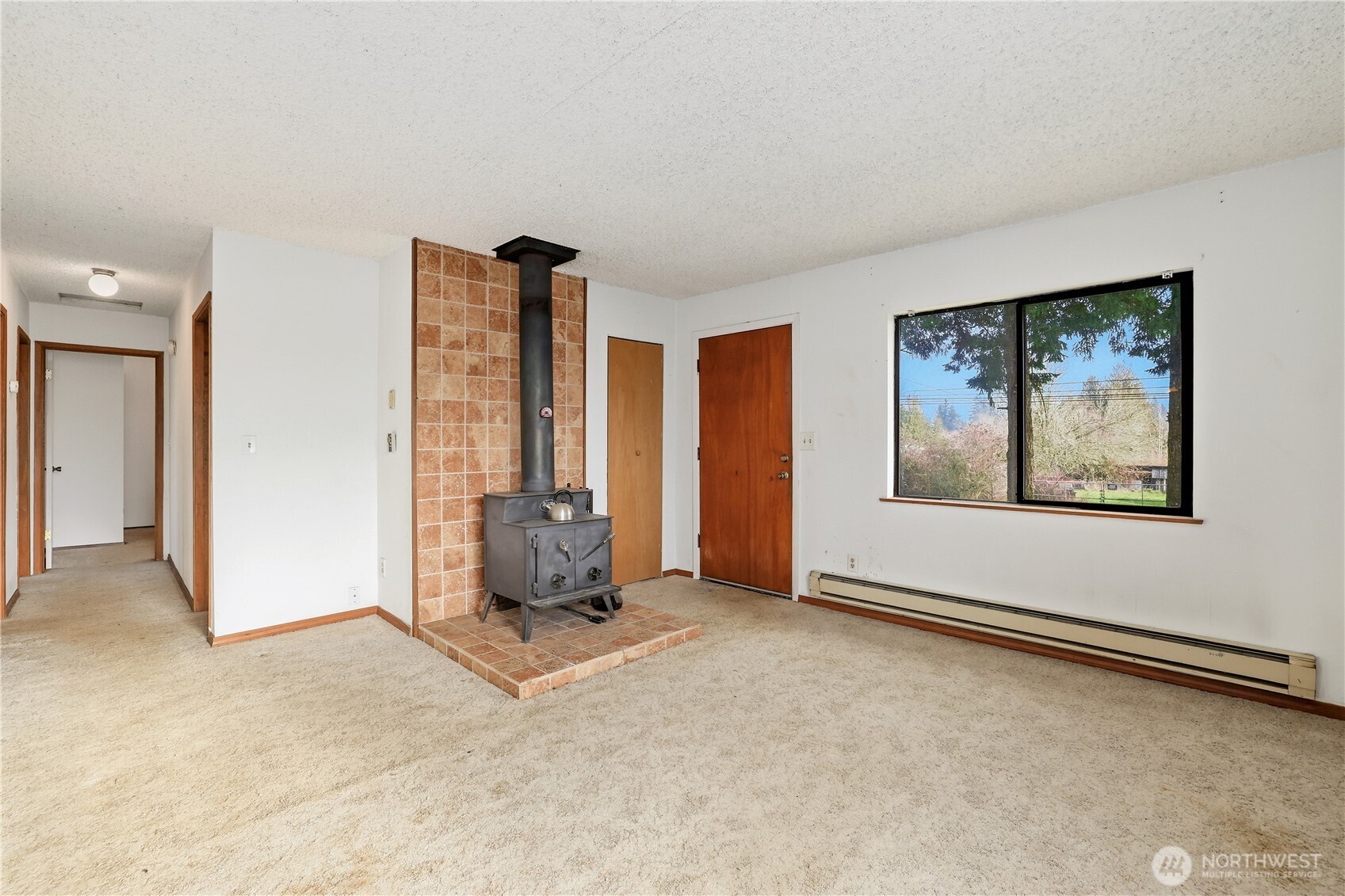 12204 Waller Road East Tacoma, WA 98446 - Photo 5 of 33 an empty room with windows