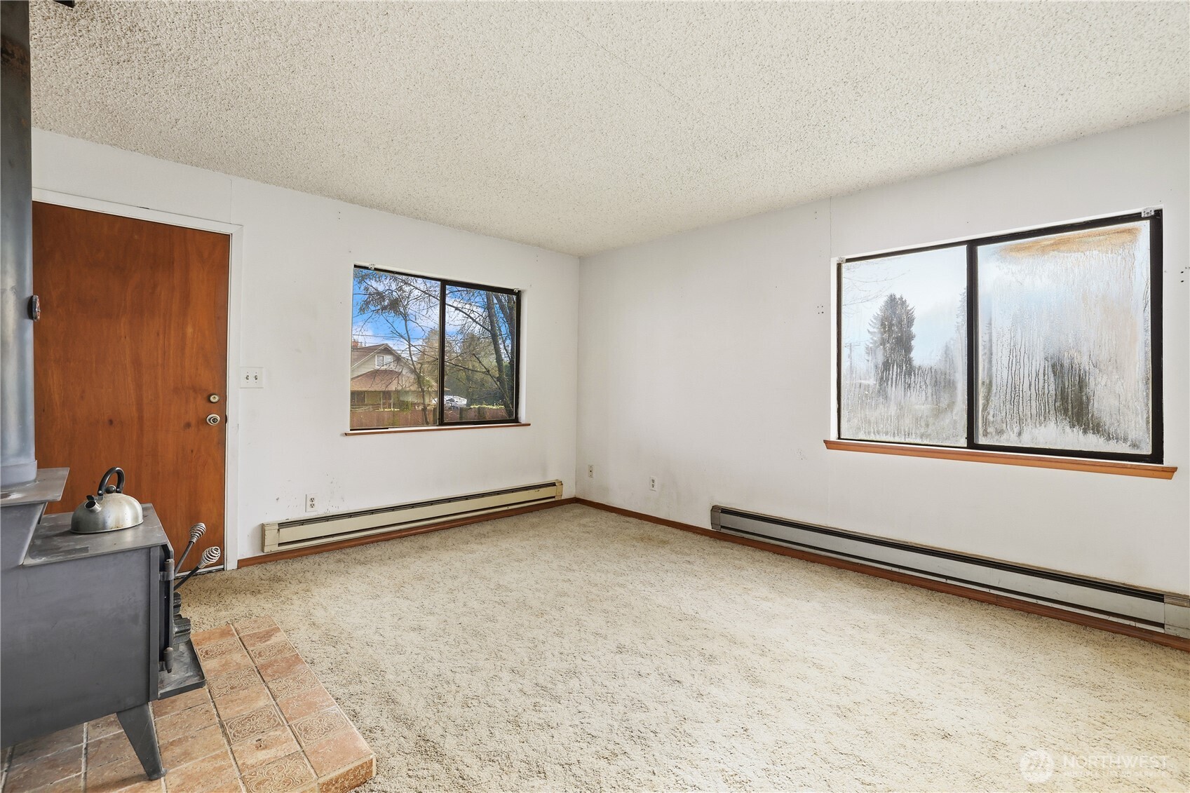 12204 Waller Road East Tacoma, WA 98446 - Photo 6 of 33 a view of an empty room with window