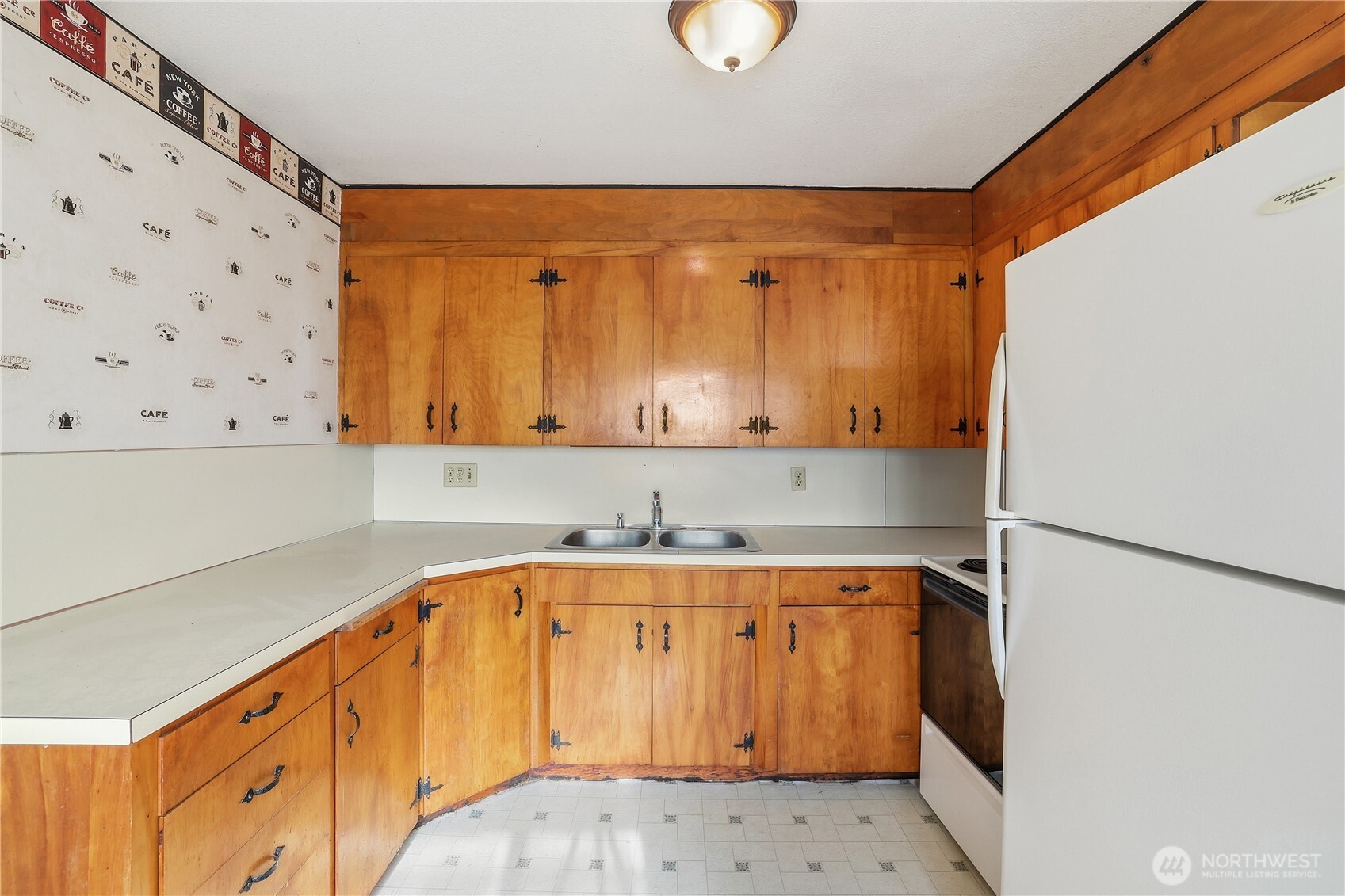 12204 Waller Road East Tacoma, WA 98446 - Photo 9 of 33 a bathroom with a sink and a mirror