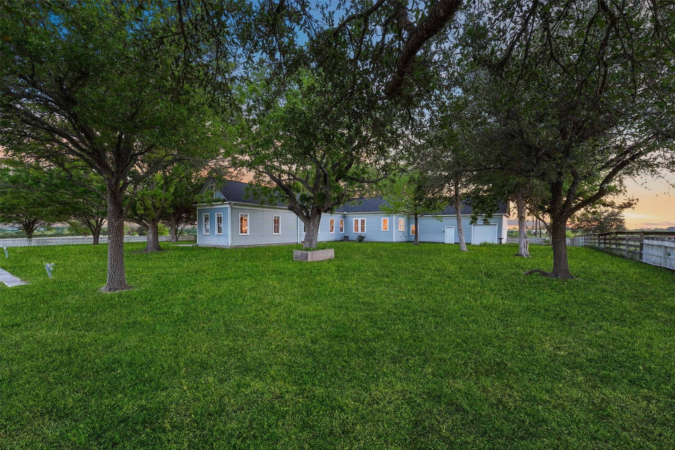 9058 Sam Houston Road Brenham, TX 77833 - Photo 28 of 49 a view of a house with a backyard