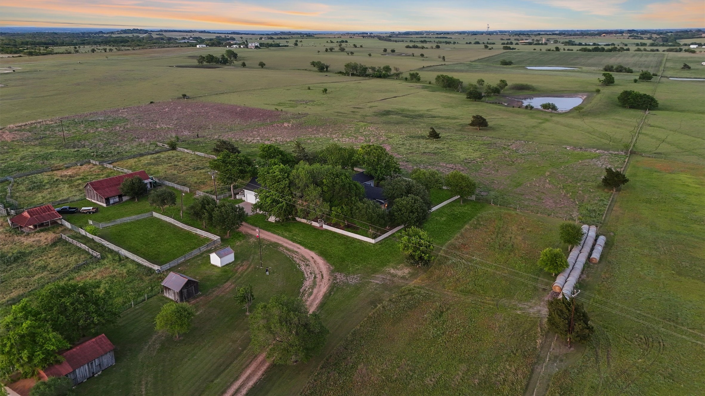 9058 Sam Houston Road Brenham, TX 77833 - Photo 31 of 49 an aerial view of a houses with a lake