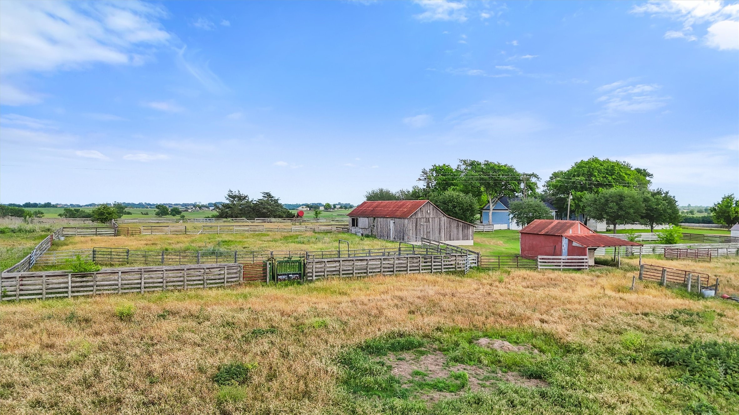 9058 Sam Houston Road Brenham, TX 77833 - Photo 34 of 49 a view of a lake with a yard and a large tree