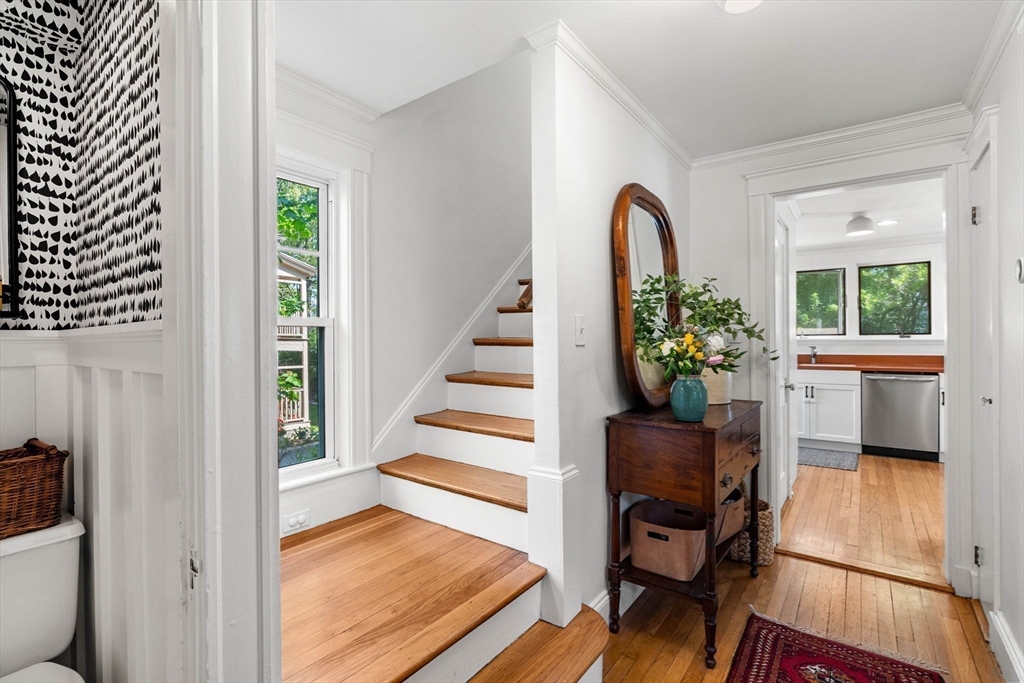 34 Avalon Road Milton, MA 02186 - Photo 5 of 42 a view of entryway with wooden floor and stairs