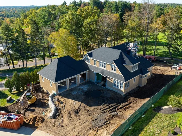 a view of a patio with table and chairs and potted plants