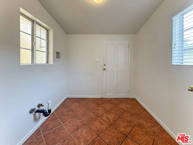 a view of a room with a window