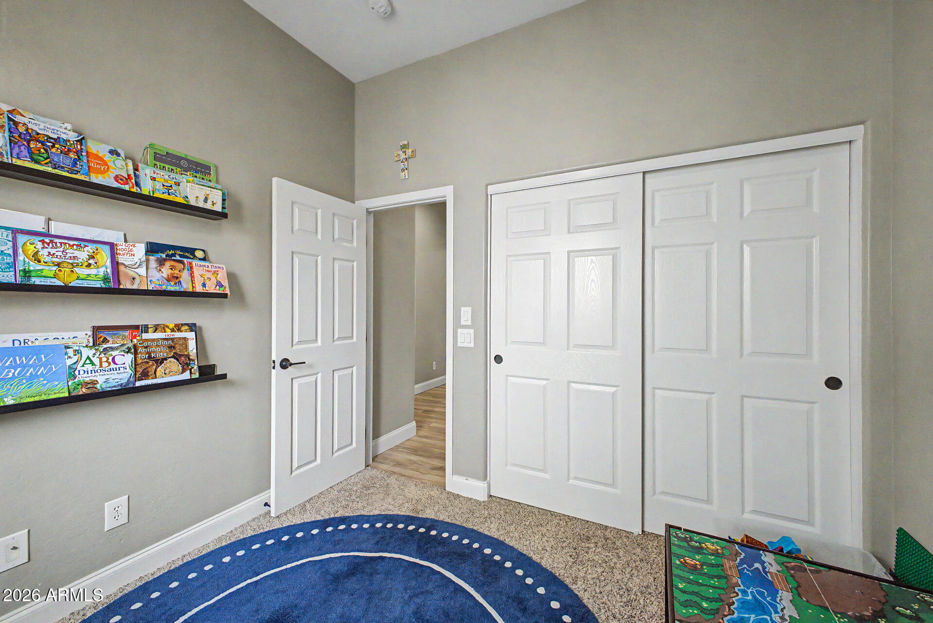 4272 East Buckboard Road Gilbert, AZ 85297 - Photo 25 of 37 a view of an entryway with wooden floor