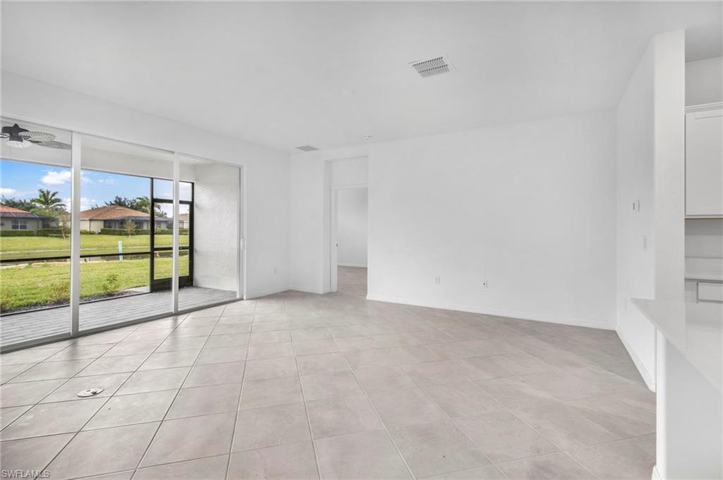 2265 Avocado Lane Naples, FL 34102 - Photo 3 of 32 a view of a livingroom with an empty space and a sink